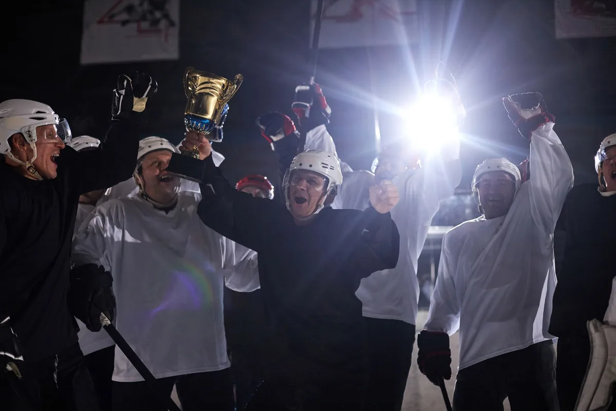 Equipo de hockey celebrando la clasificación en el torneo